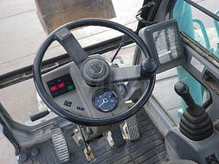 Экскаватор колёсный Kobelco SK100W-2 1996г